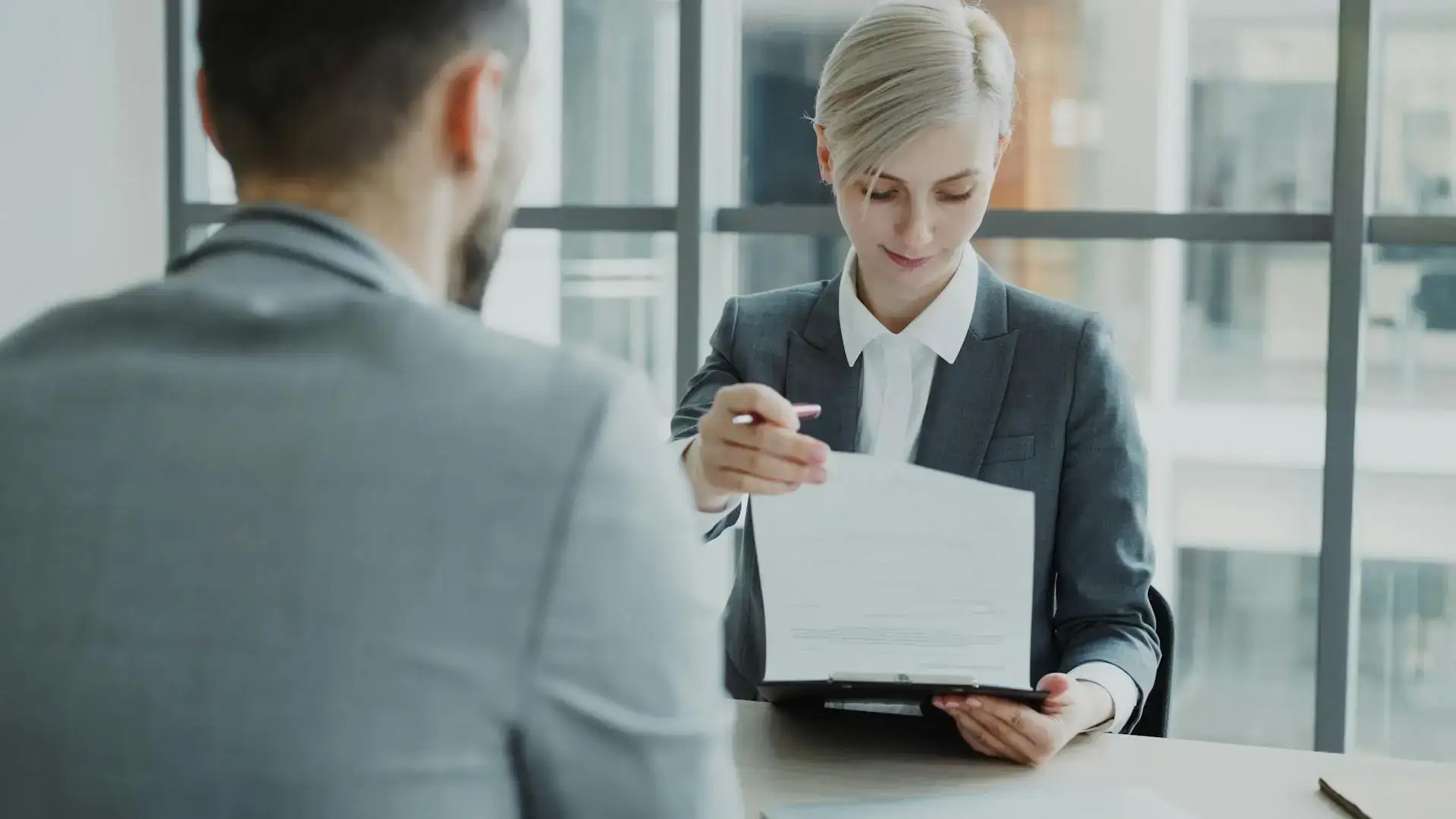 Business Meeting With Contract Review in Office