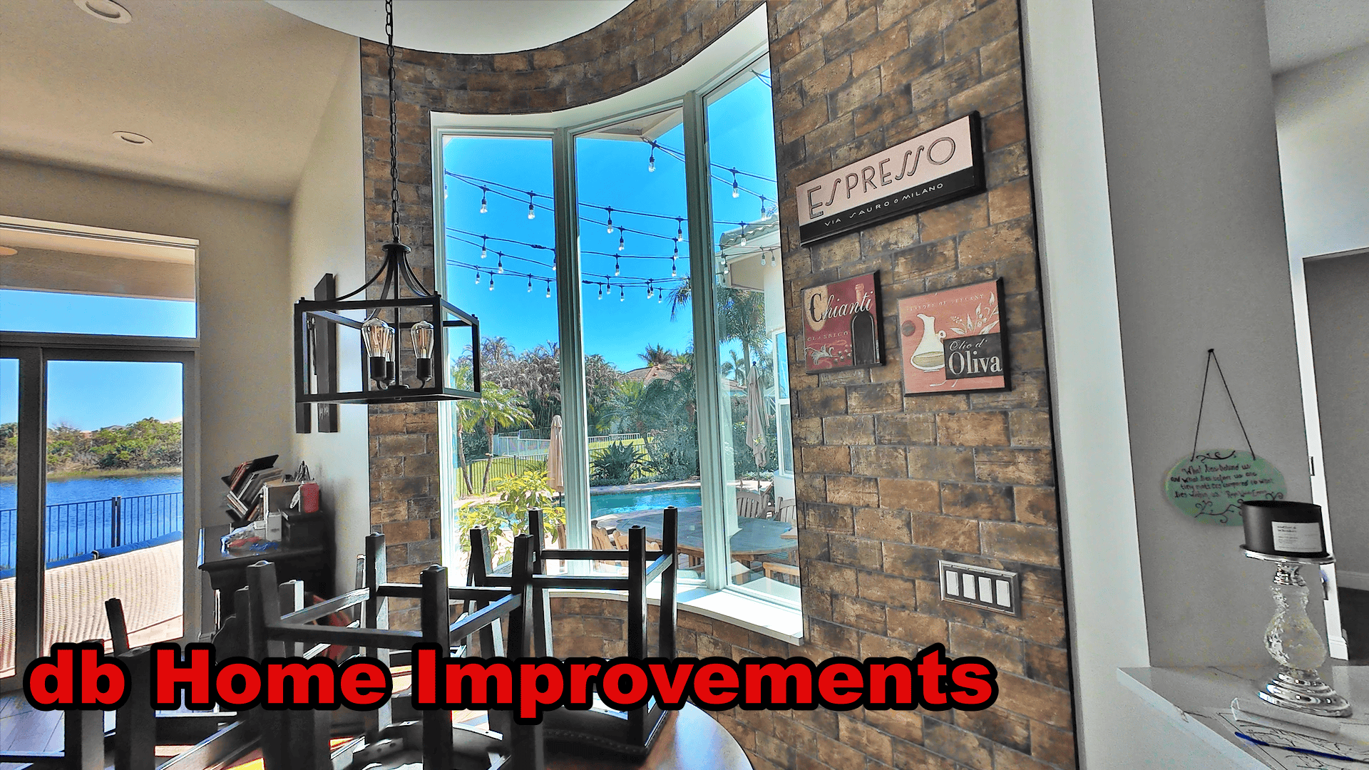 Custom Curved Architectural Impact Window Installation Custom curved architectural impact window and sliding patio doors looking outside Palm CityFlorida home.