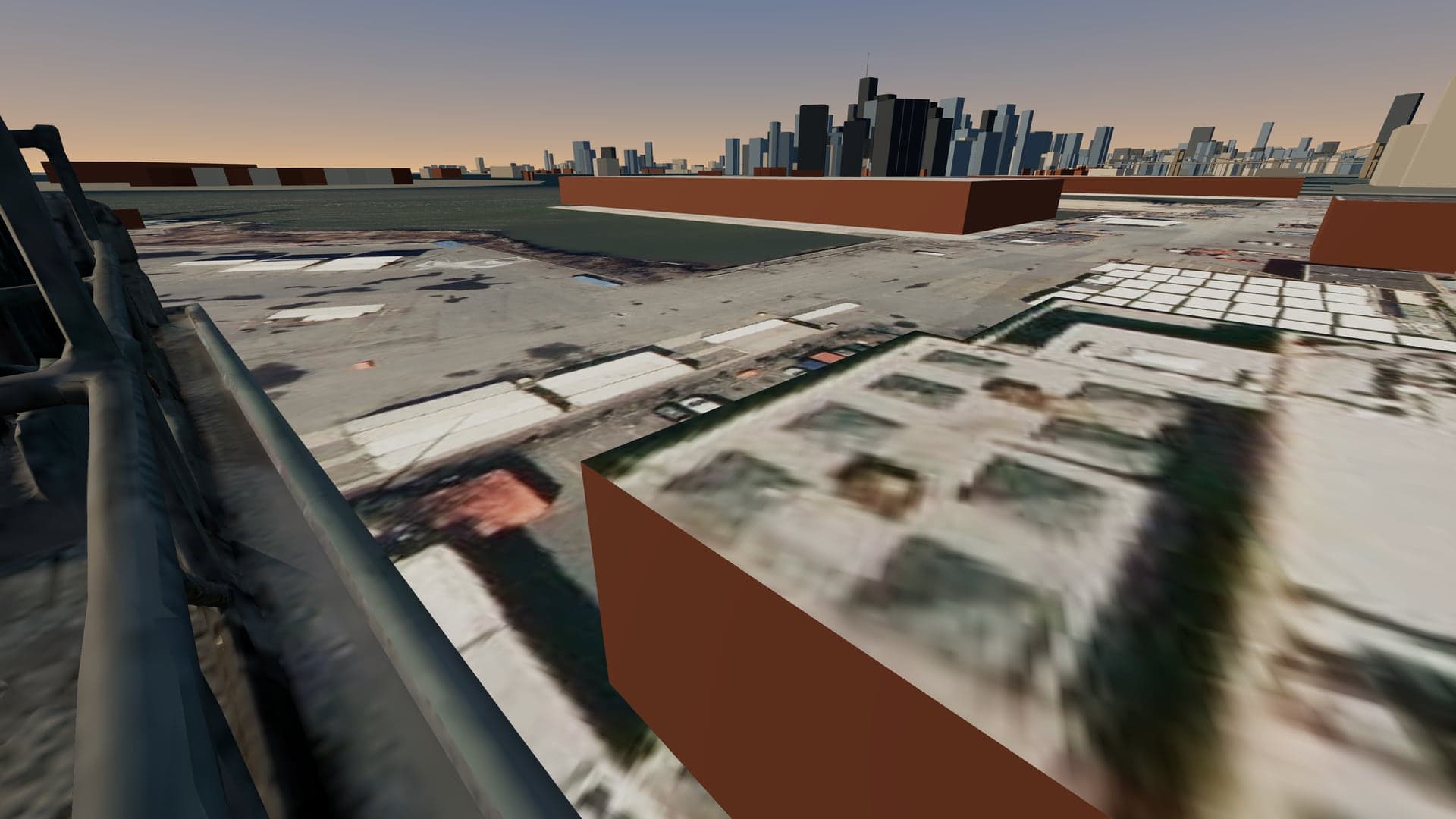 Looking over the north edge of the AREMES HQ roof: the marine terminal and the harbor below, lower Manhattan beyond