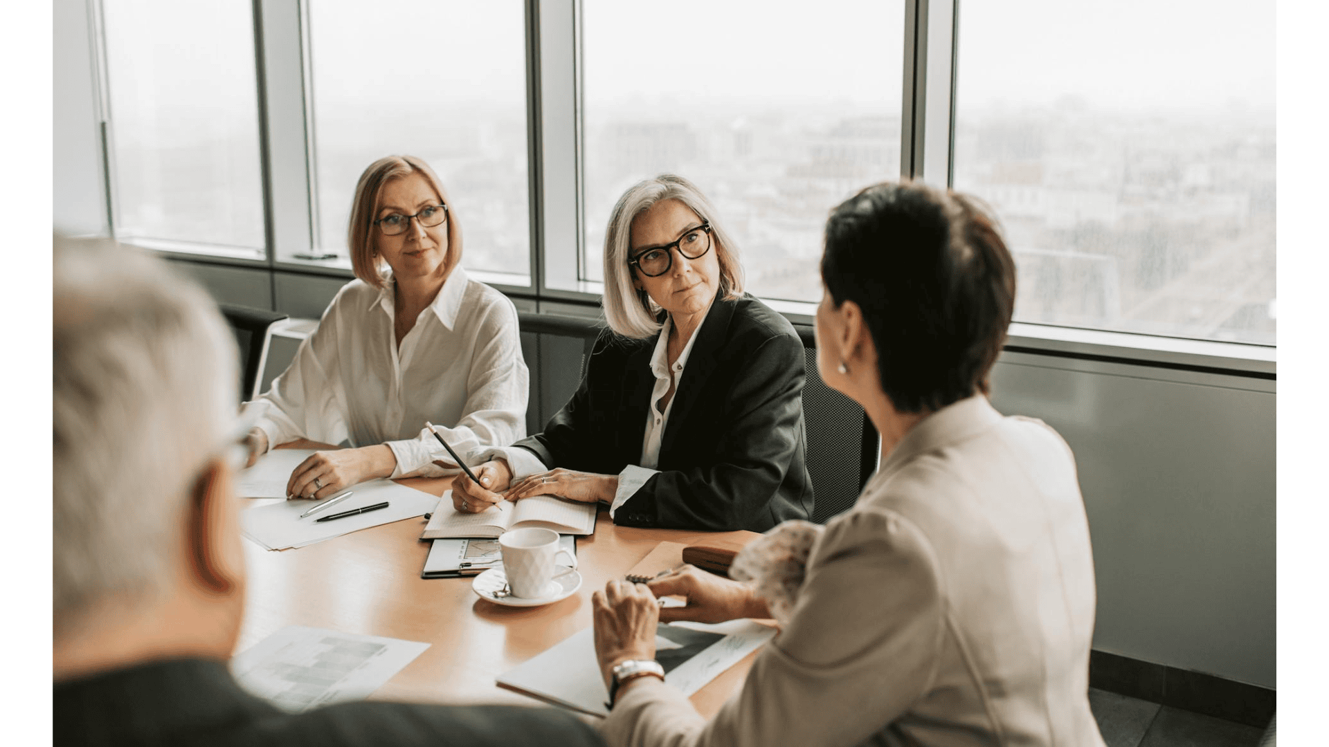 three women in a meeting at work
