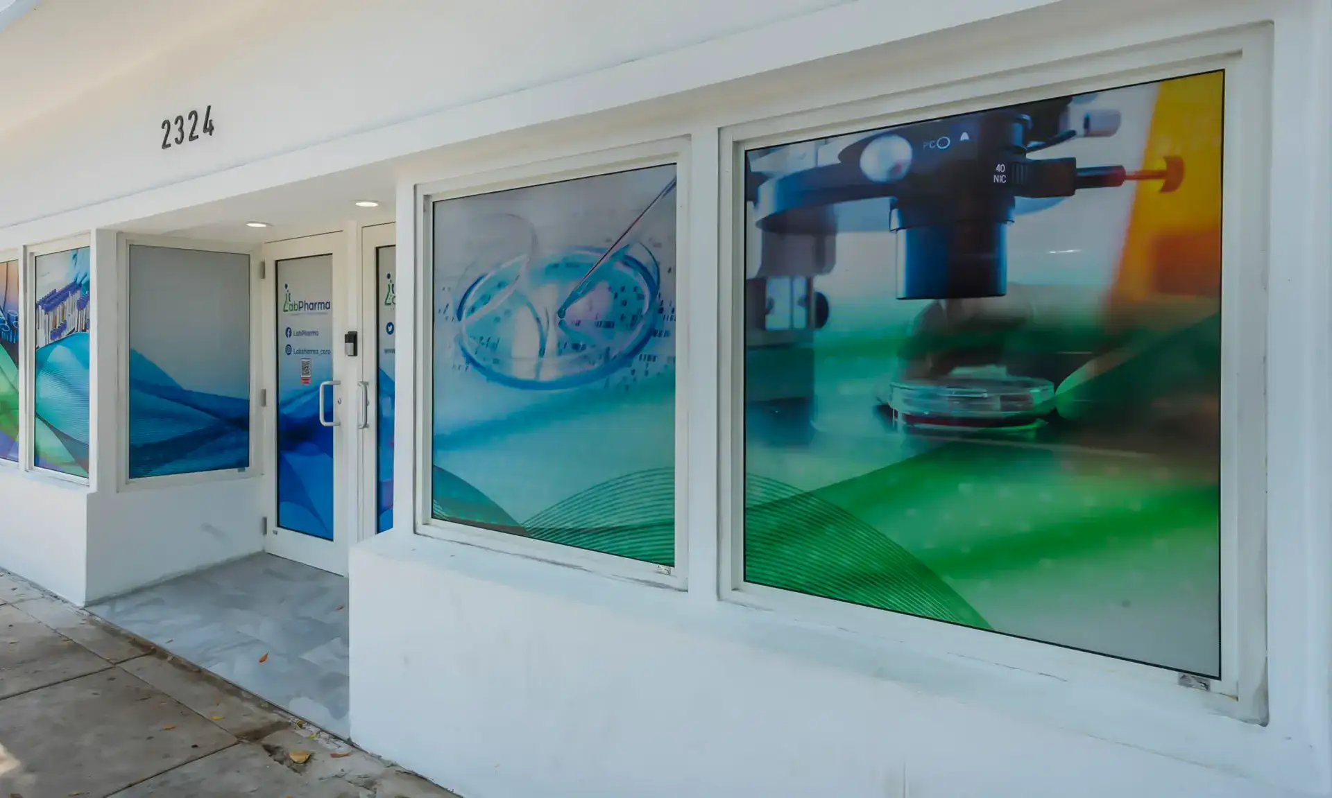 front exterior view of the Labpharma laboratory facility and main entrance