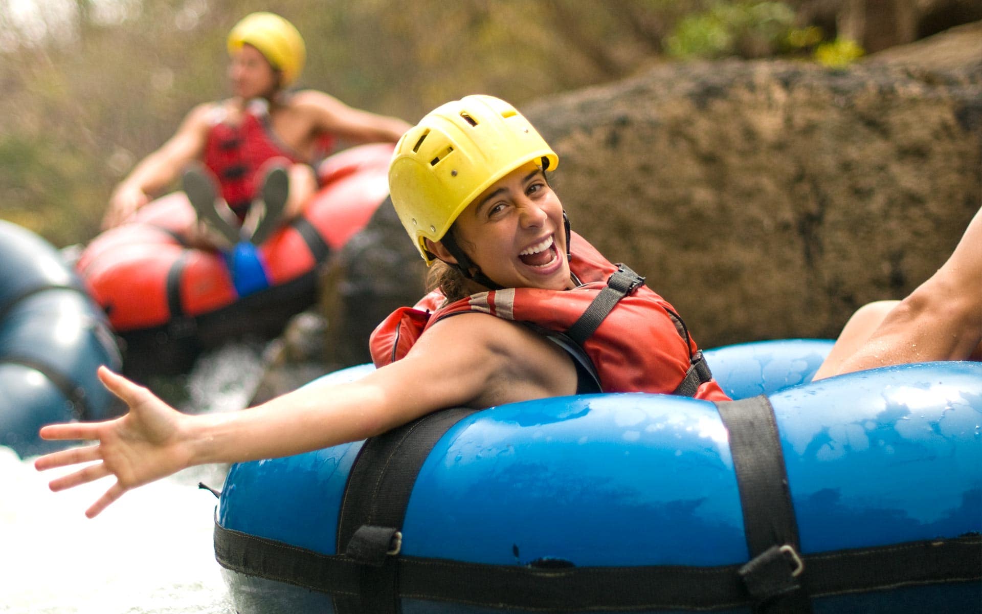 Tourists enjoying the ultimate One Day Adventure Pass at Hacienda Guachipelin in Guanacaste, Costa Rica.