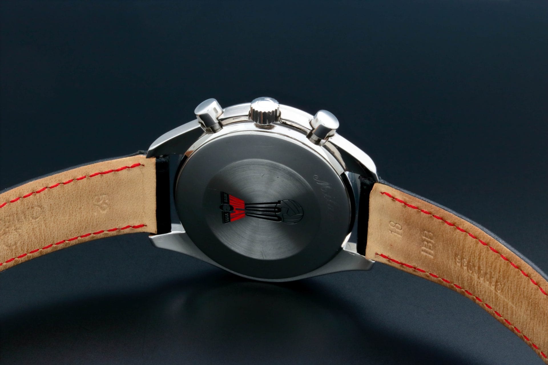 Omega Speedmaster A.C. Milan 3810.51.41 case back. The top of the case back is engraved "Milan AC" and the bottom is engraved with the edition number of “No. XXXX / 1999”.