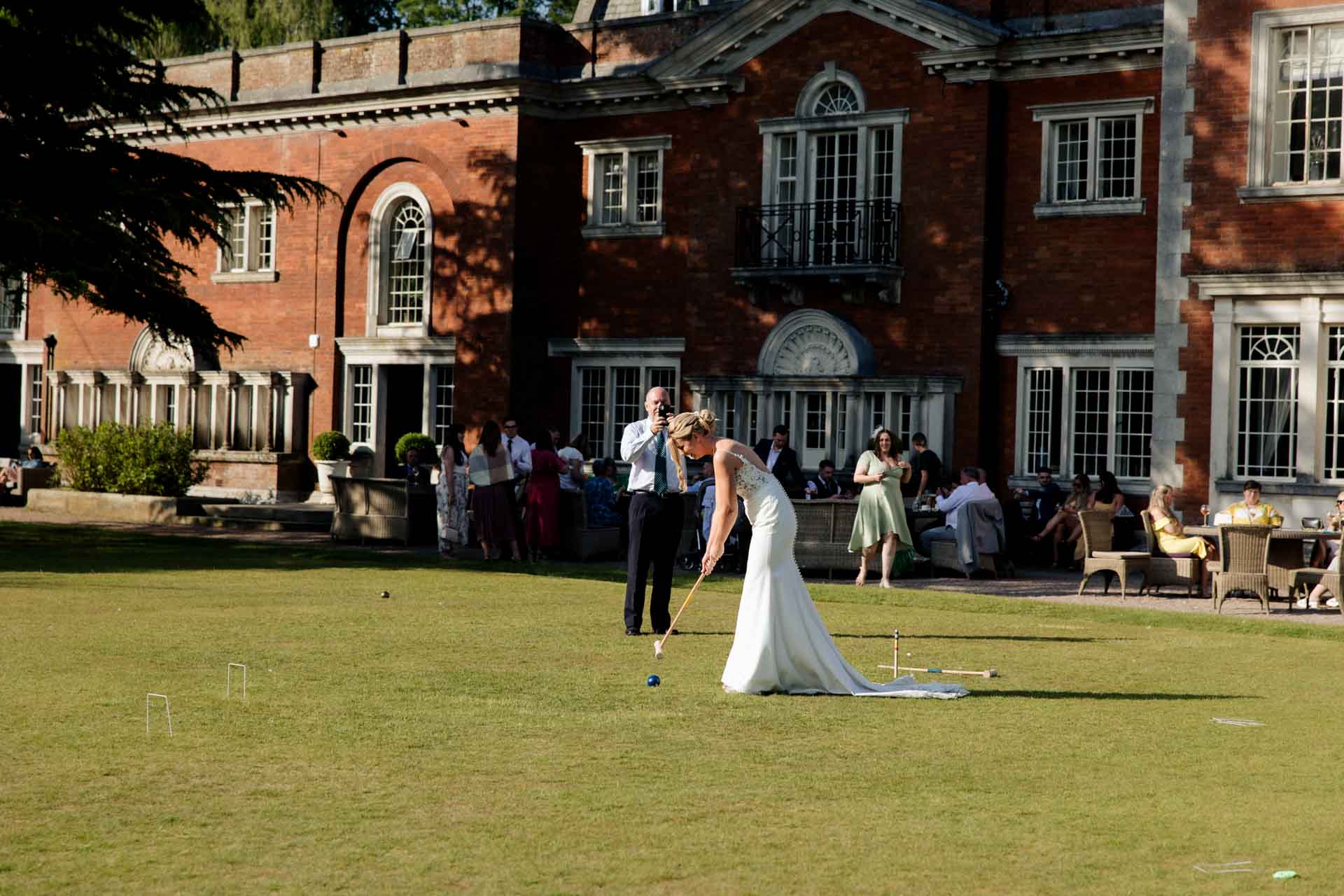 garden games on the lawn at eaves hall during a wedding