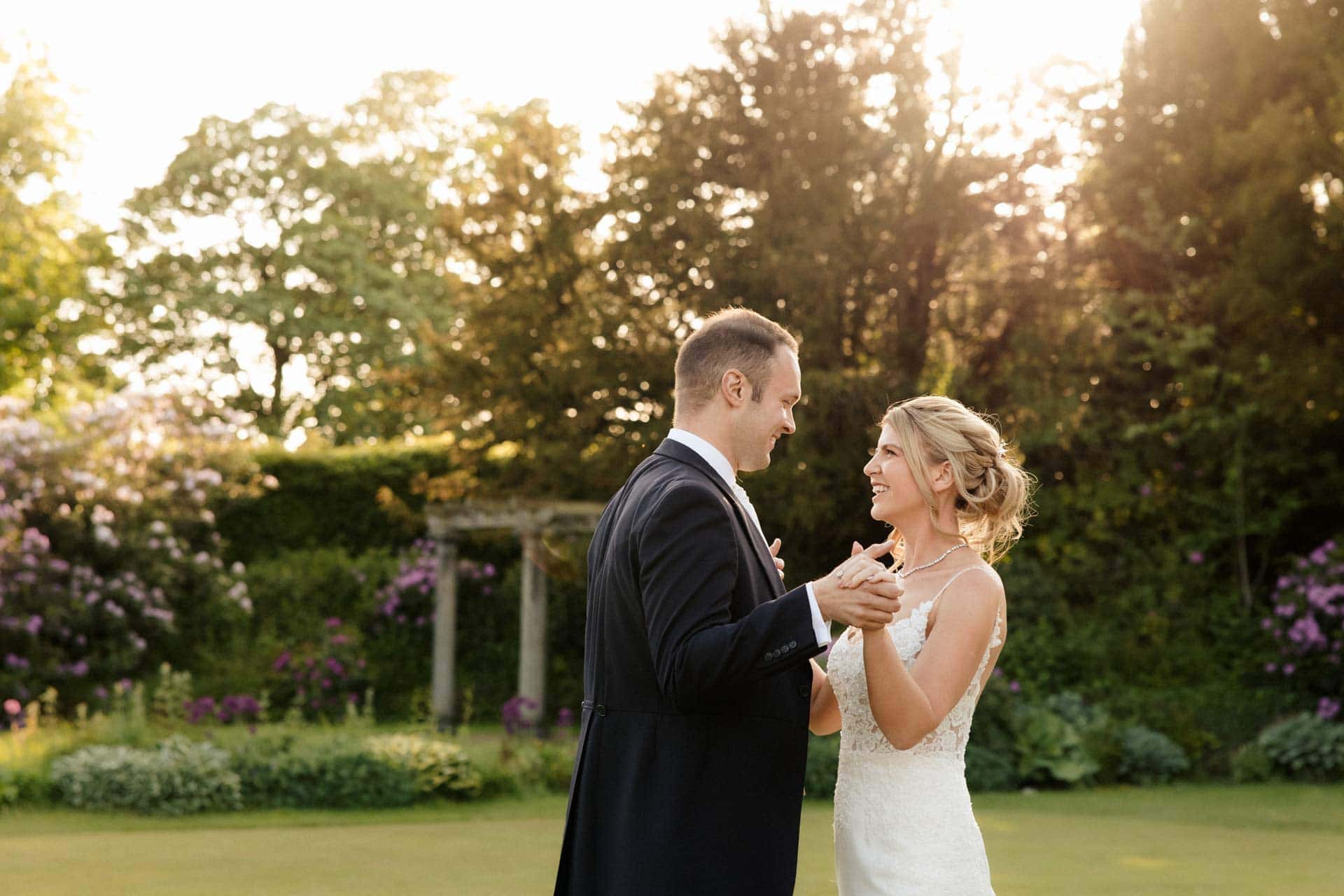 sunset photos at eaves hall in lancashire of a bride and groom