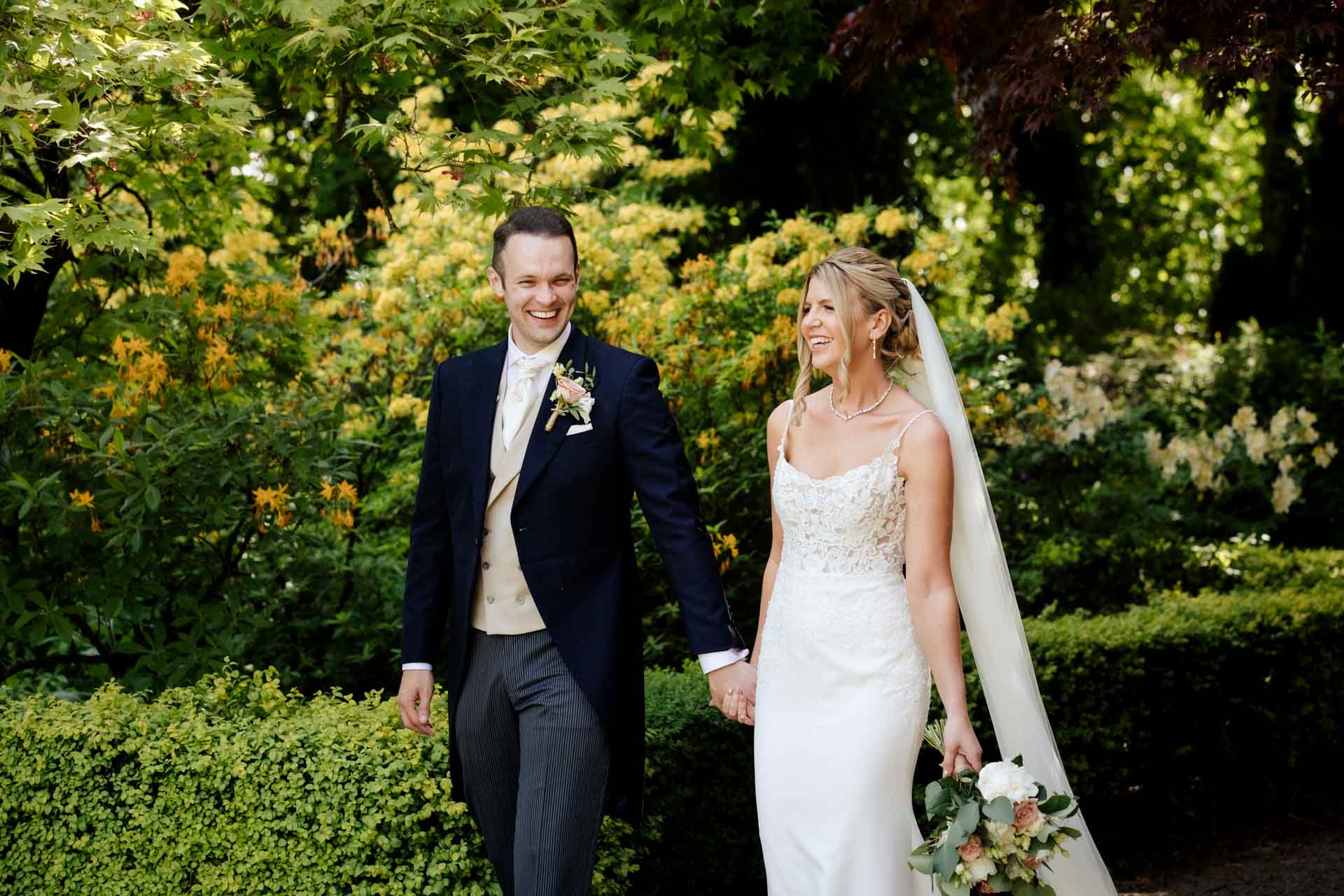 eaves hall wedding photography bride and groom in the gardens