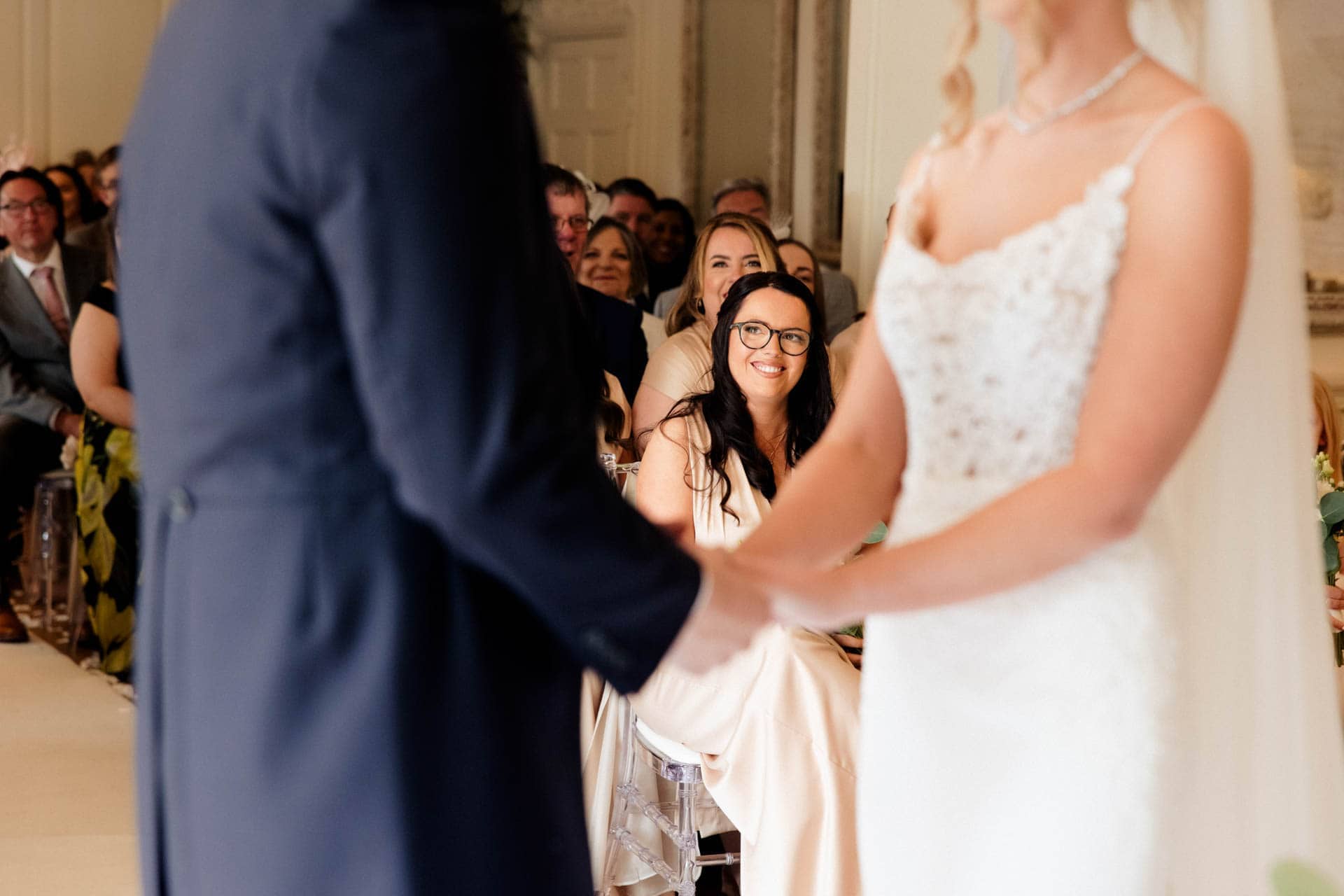 the wedding ceremony inside eaves hall wedding venue in lancashire
