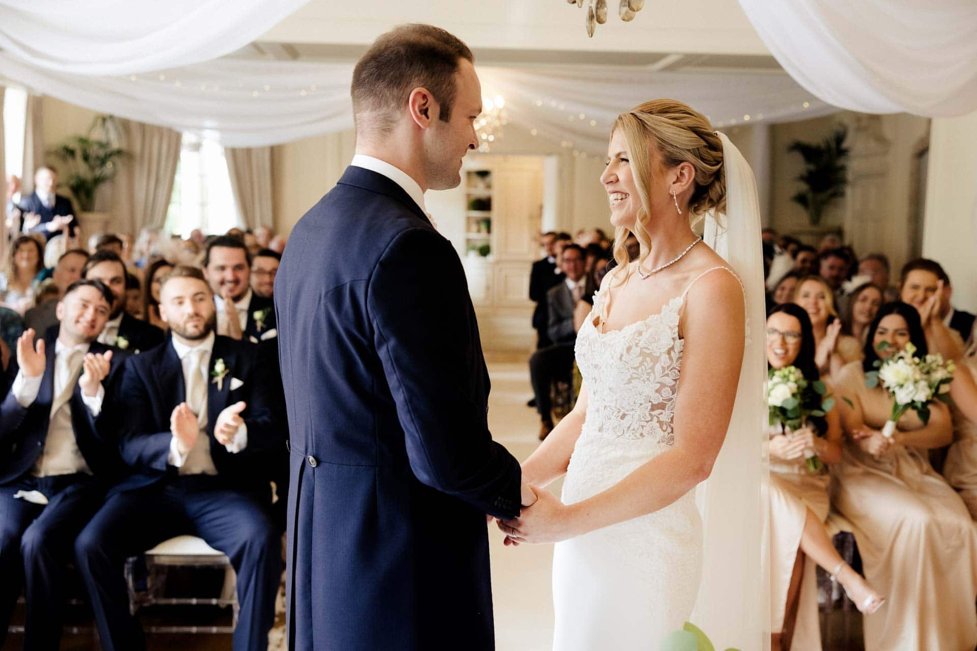 the wedding ceremony inside eaves hall wedding venue in lancashire