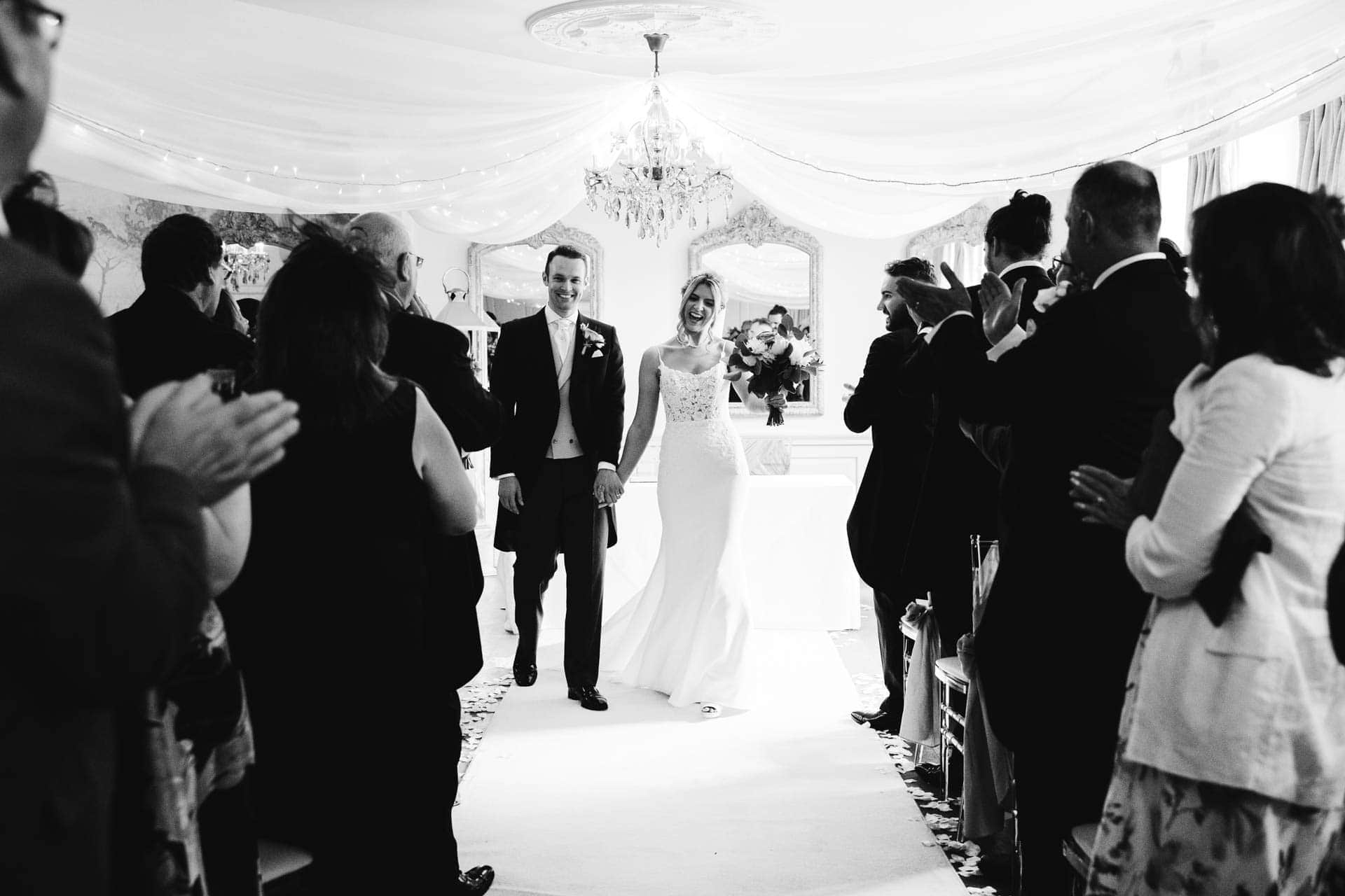 the wedding ceremony inside eaves hall wedding venue in lancashire