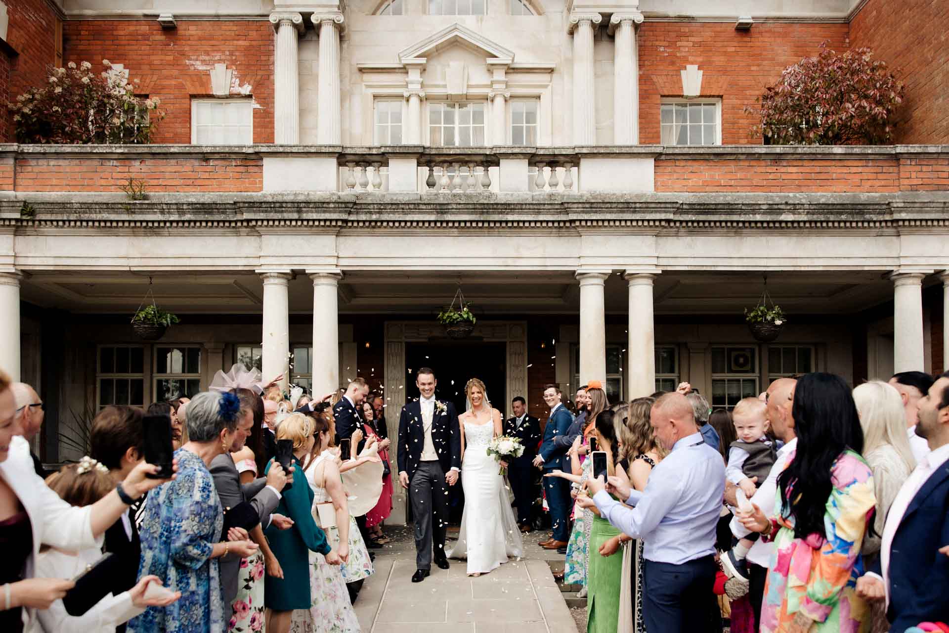 the wedding ceremony inside eaves hall wedding venue in lancashire