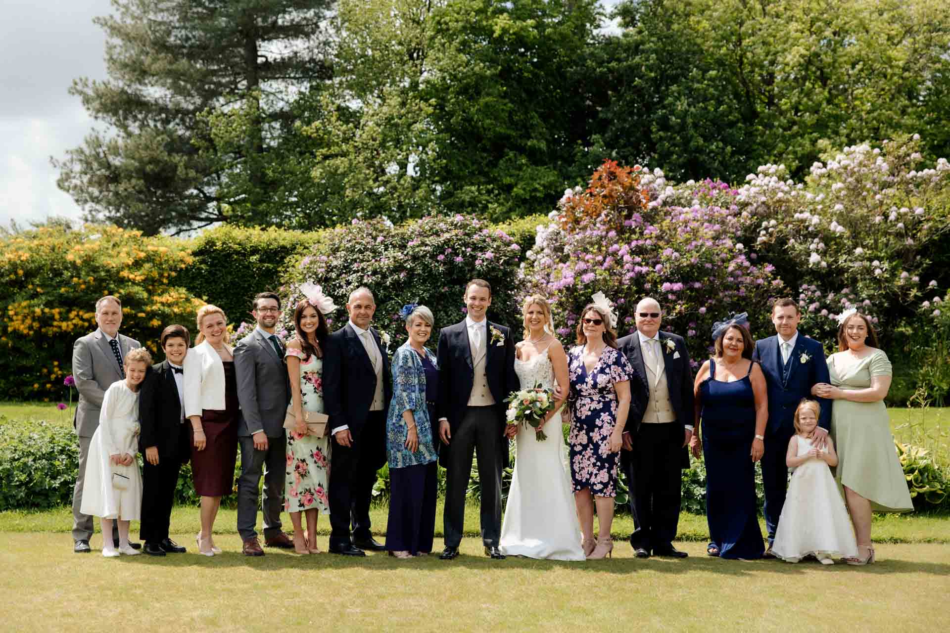 group photos outside in the grounds of eaves hall