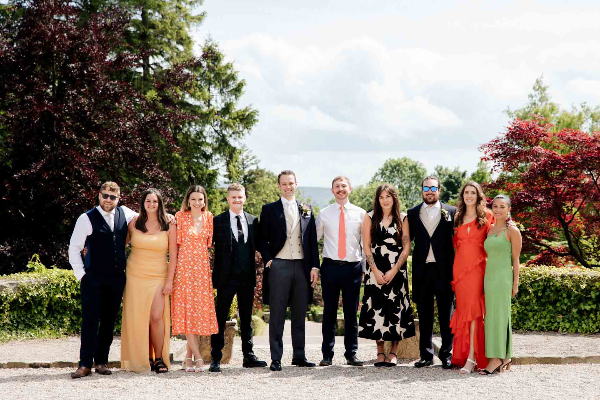 fun groomsmen photographs at eaves hall in lancashire