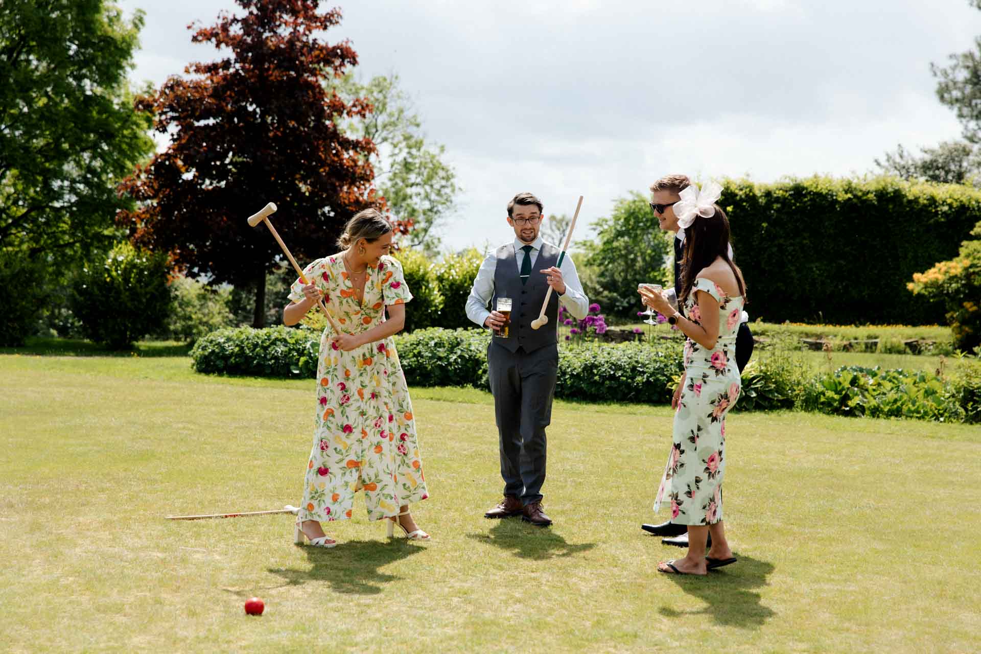 fun groomsmen photographs at eaves hall in lancashire