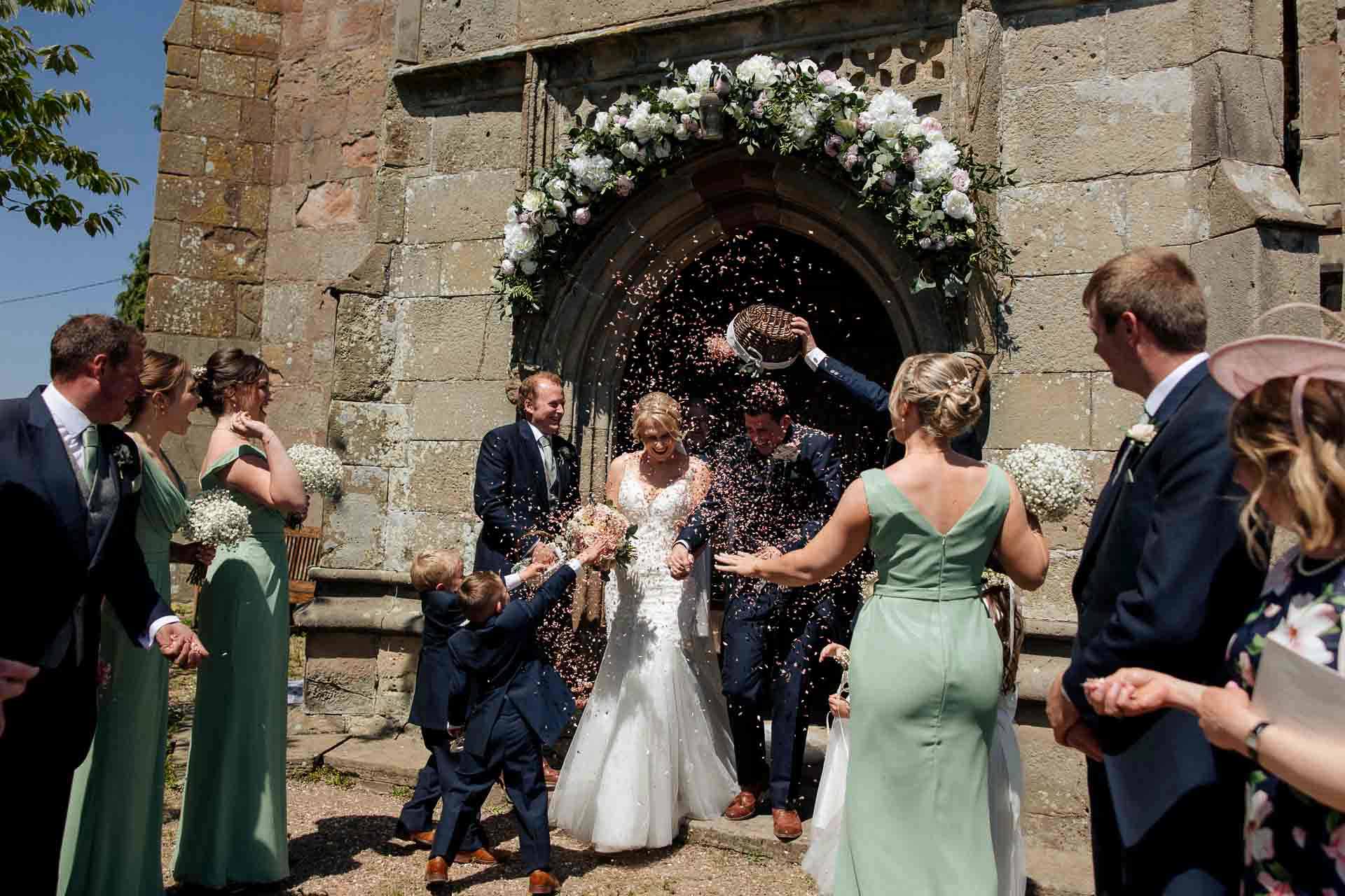 Farm wedding photography for megan and philip on their family farm in August.