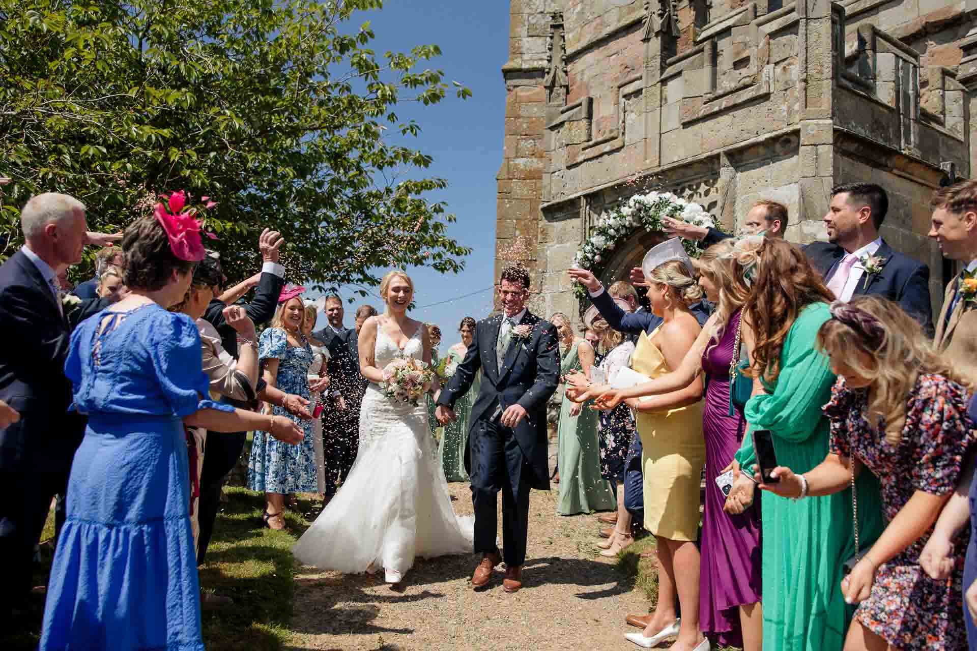 Farm wedding photography for megan and philip on their family farm in August.