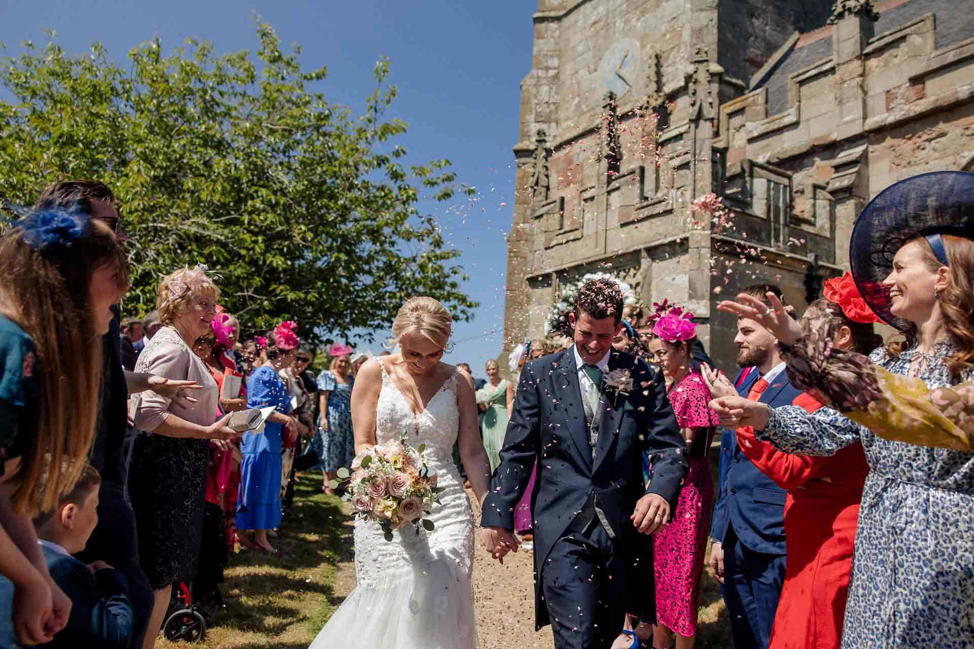 Farm wedding photography for megan and philip on their family farm in August.
