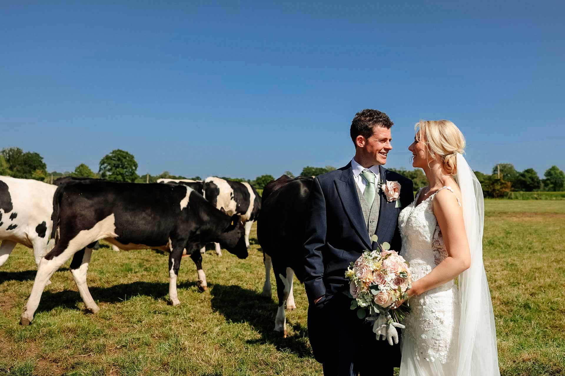Farm wedding photography for megan and philip on their family farm in August.