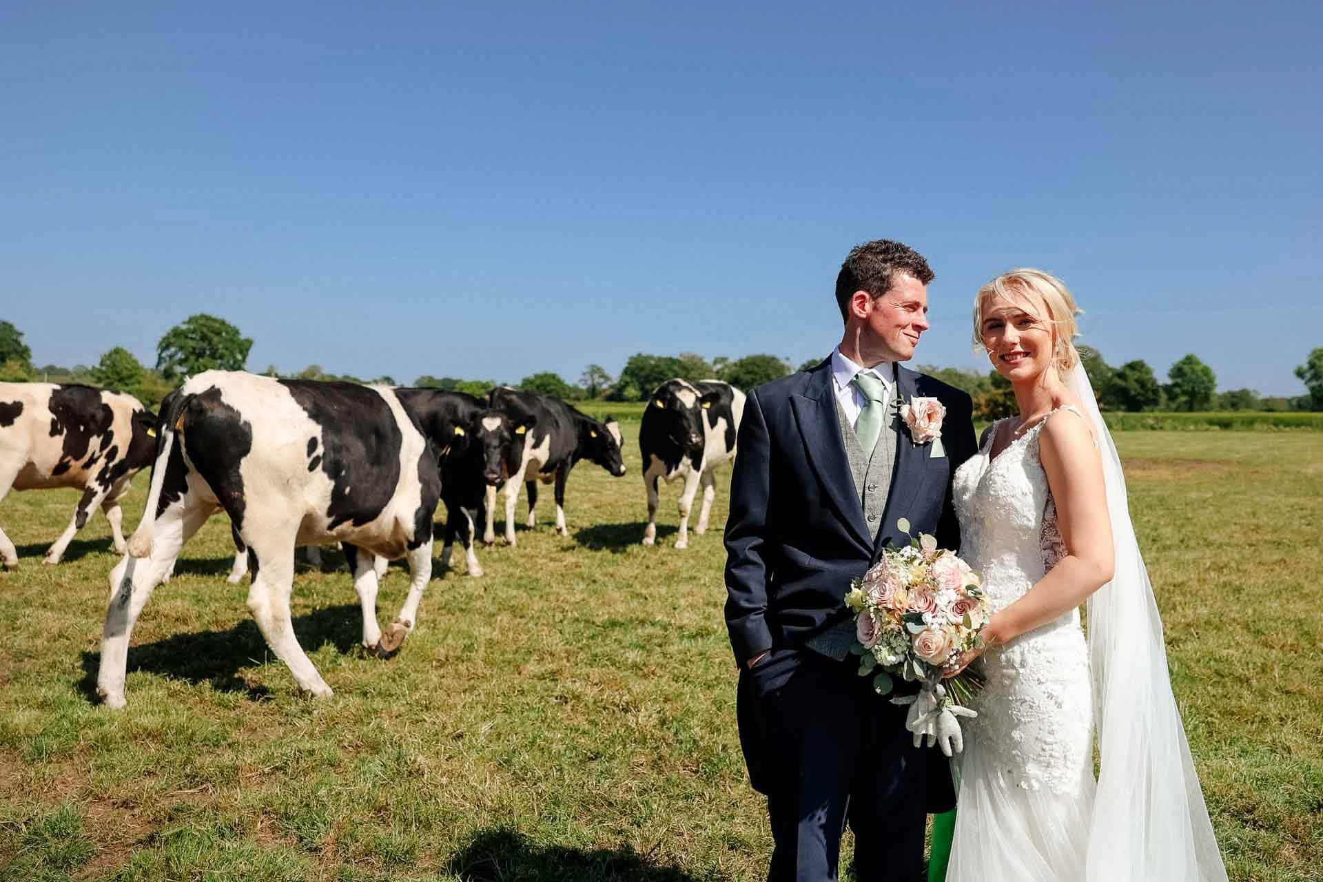 Farm wedding photography for megan and philip on their family farm in August.