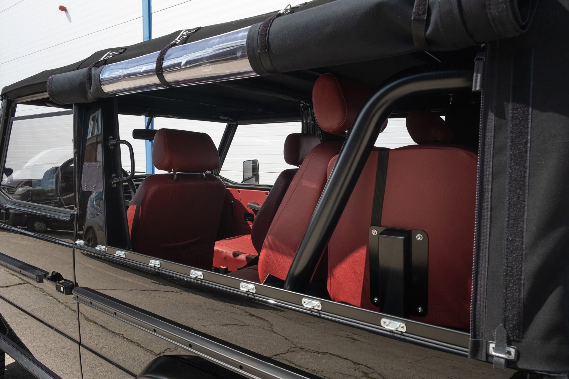 Vintage SUV restoration featuring Reaper Black exterior and Port weatherproof seating.