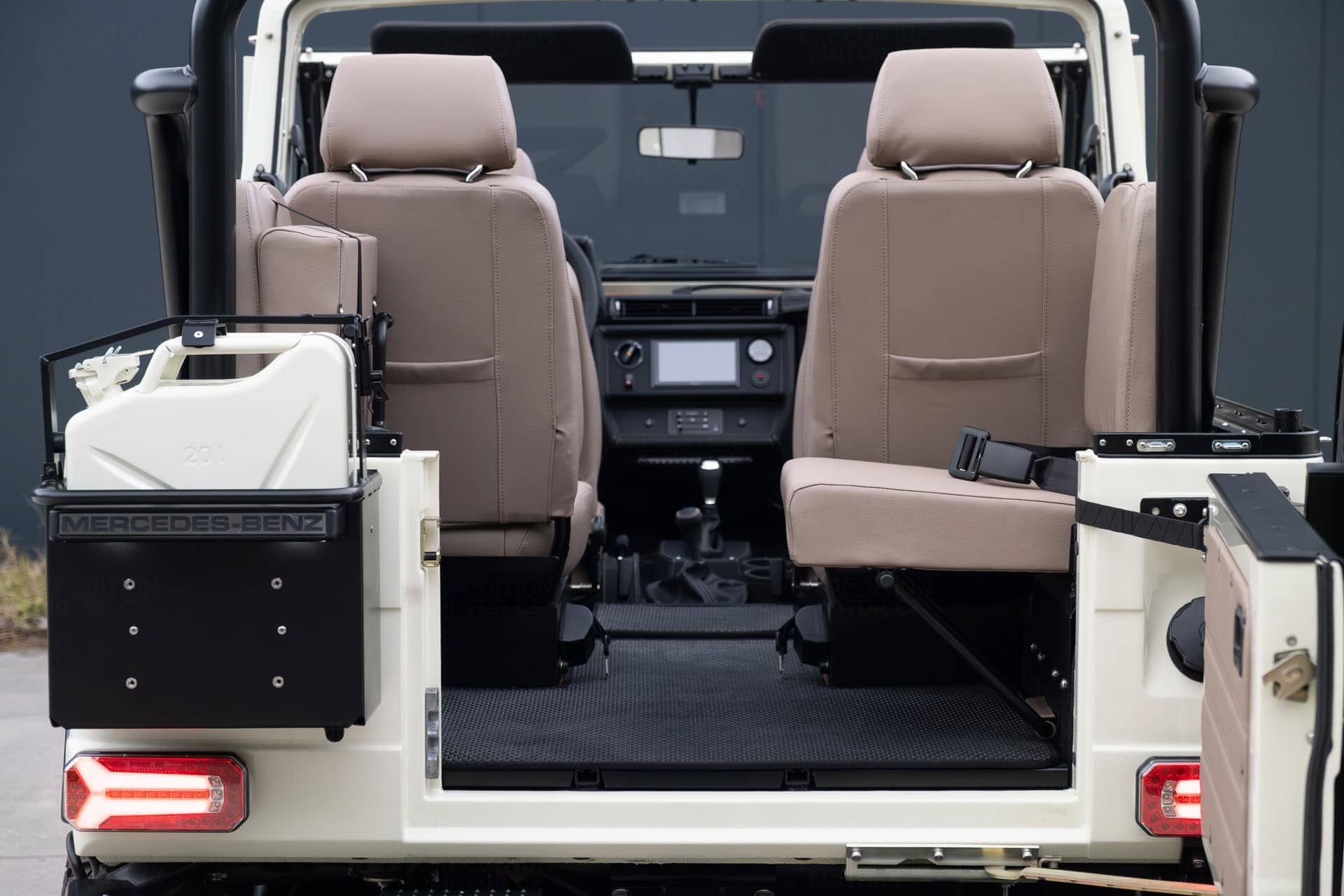 Vintage SUV restoration featuring EMC White exterior and Mushroom taupe weatherproof seating.