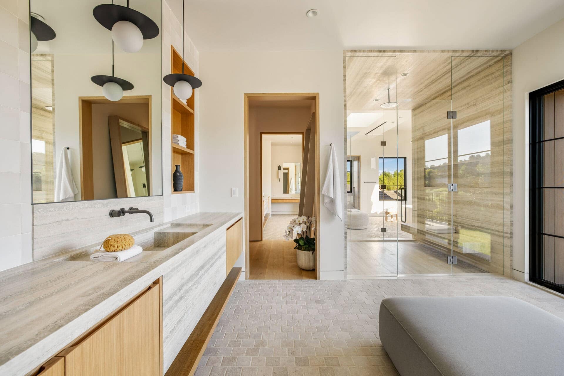 Modern bathroom featuring minimalist design with natural materials and clean lines.