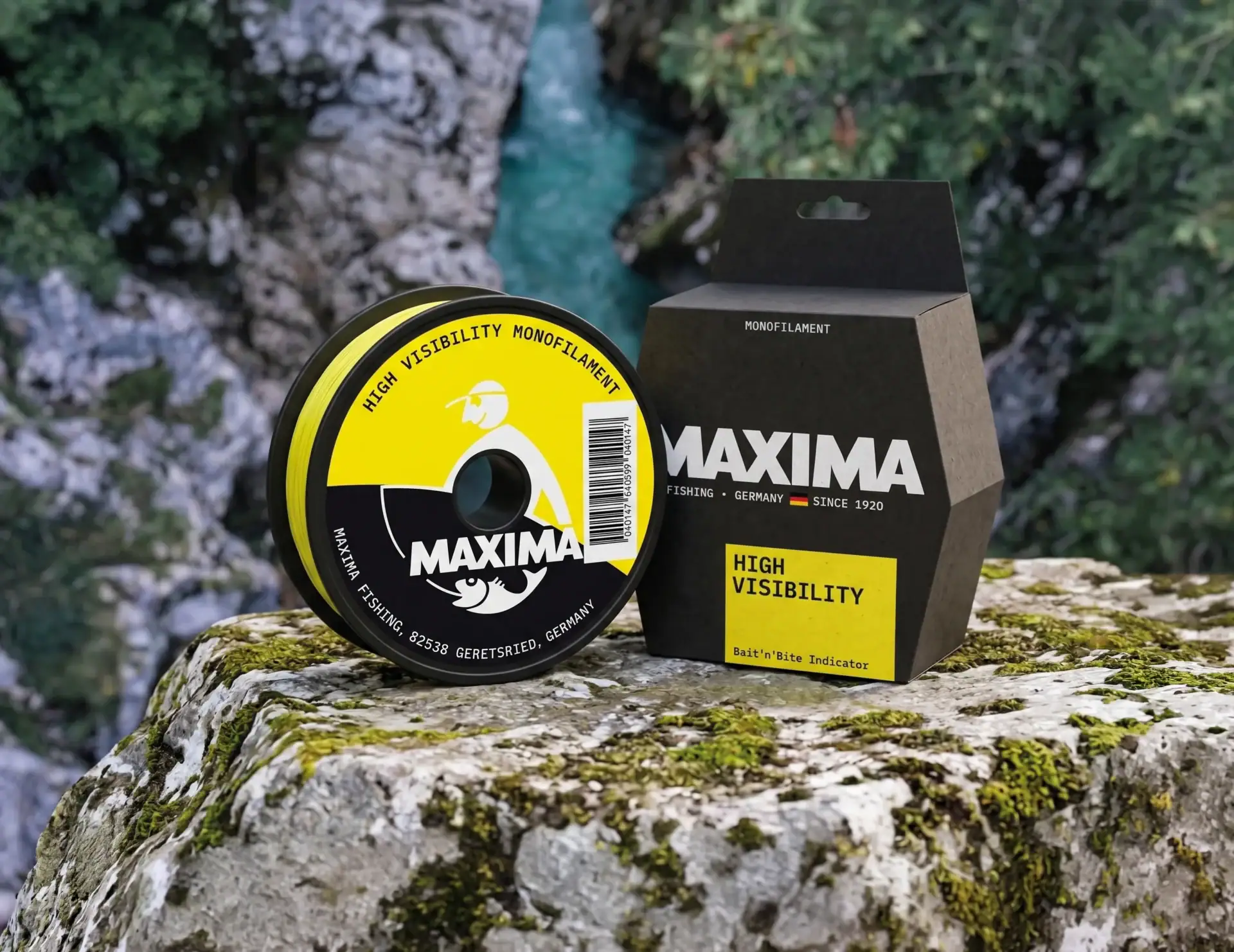 Maxima High Visibility yellow monofilament fishing line spool and dark box on a mossy rock in a gorge