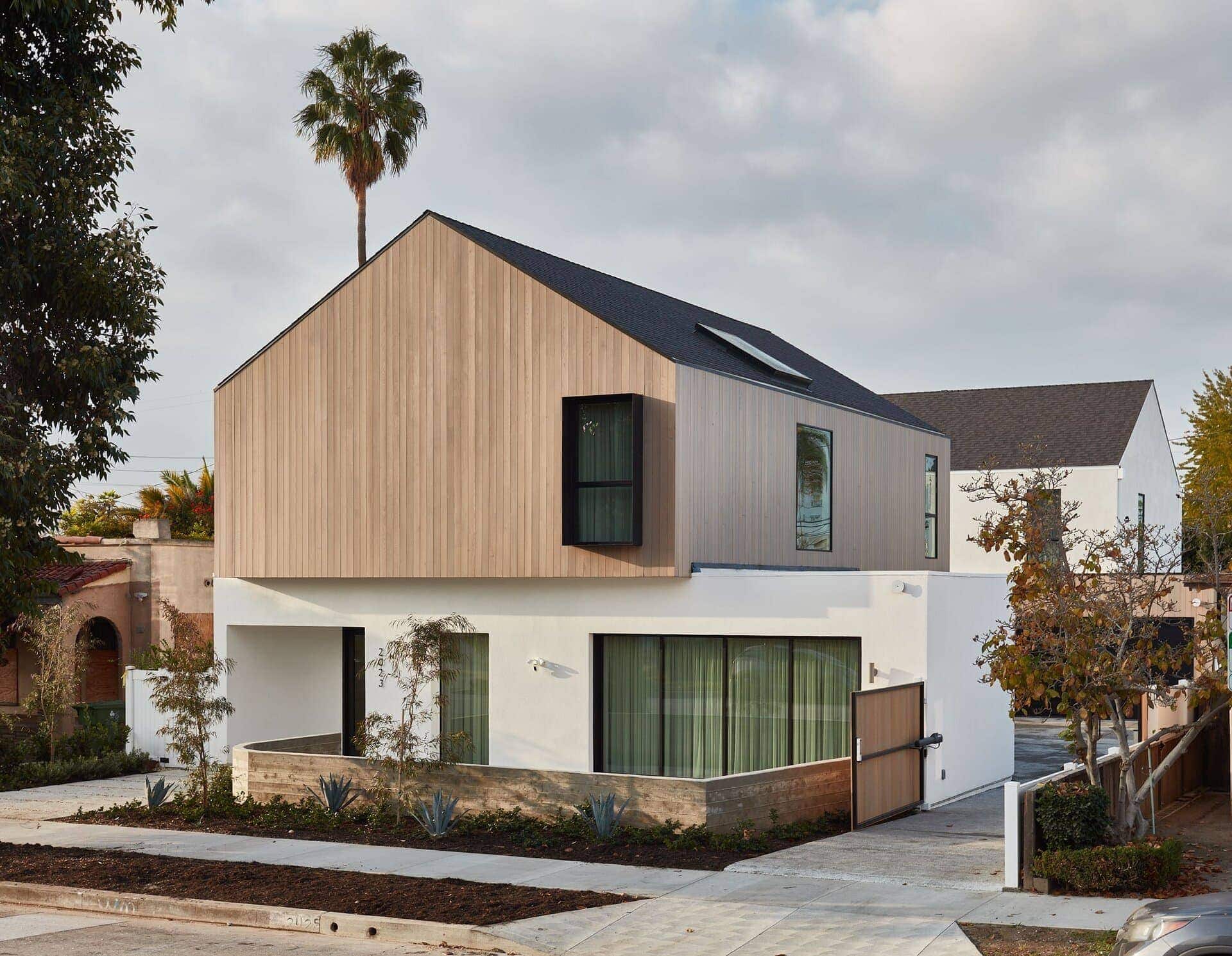 Modern residential architecture house exterior with mixed materials.