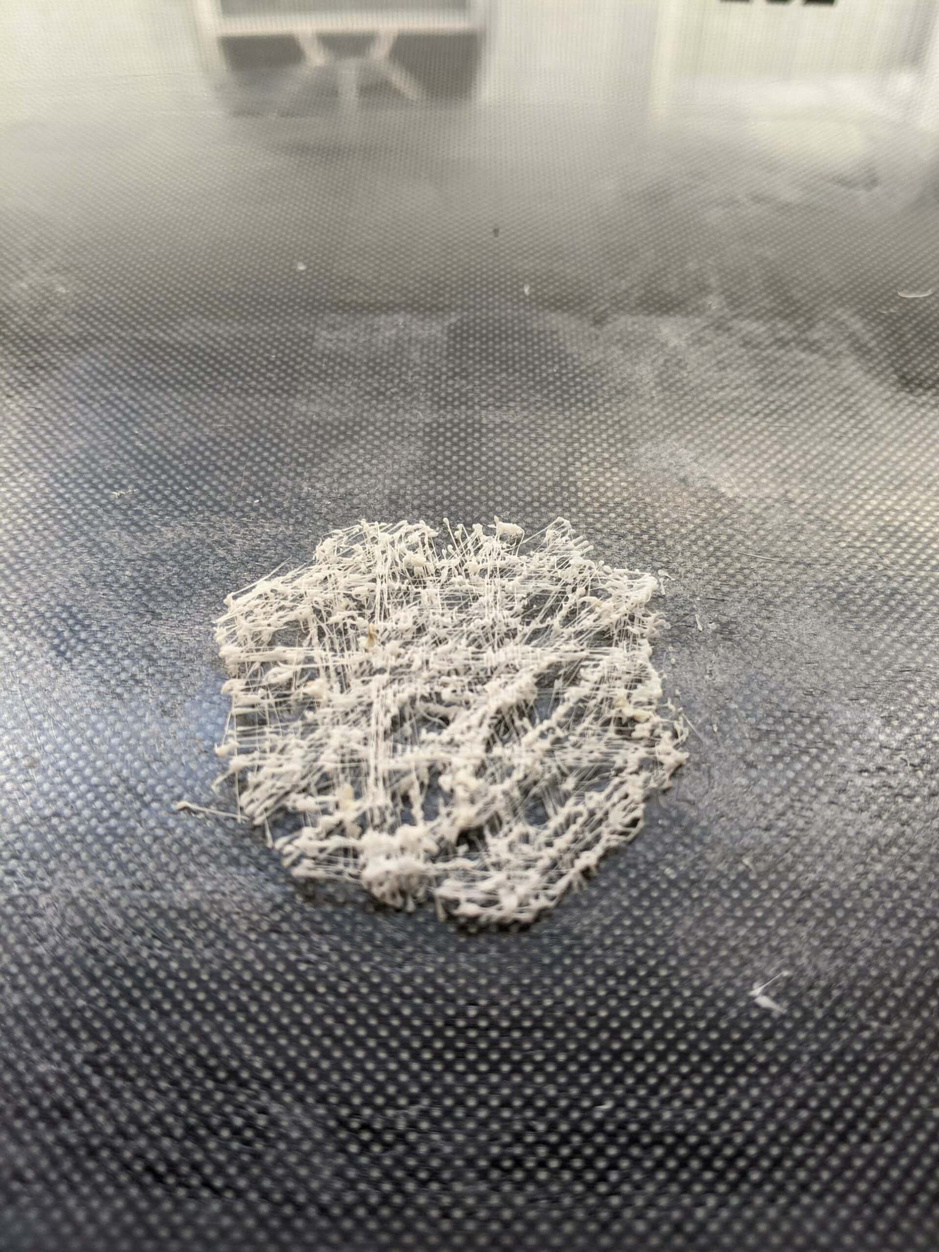 stringy bottom layer on 3d print example