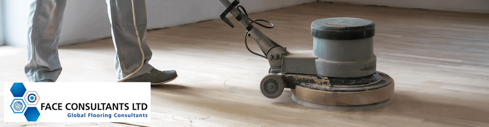 Worker in rubber boots works on a concrete floor while dust measurement monitors dust generation in real time.