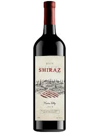 Bottle of Shiraz wine at The Morrissey House, offering rich, deep flavors that pair perfectly with hearty meals.