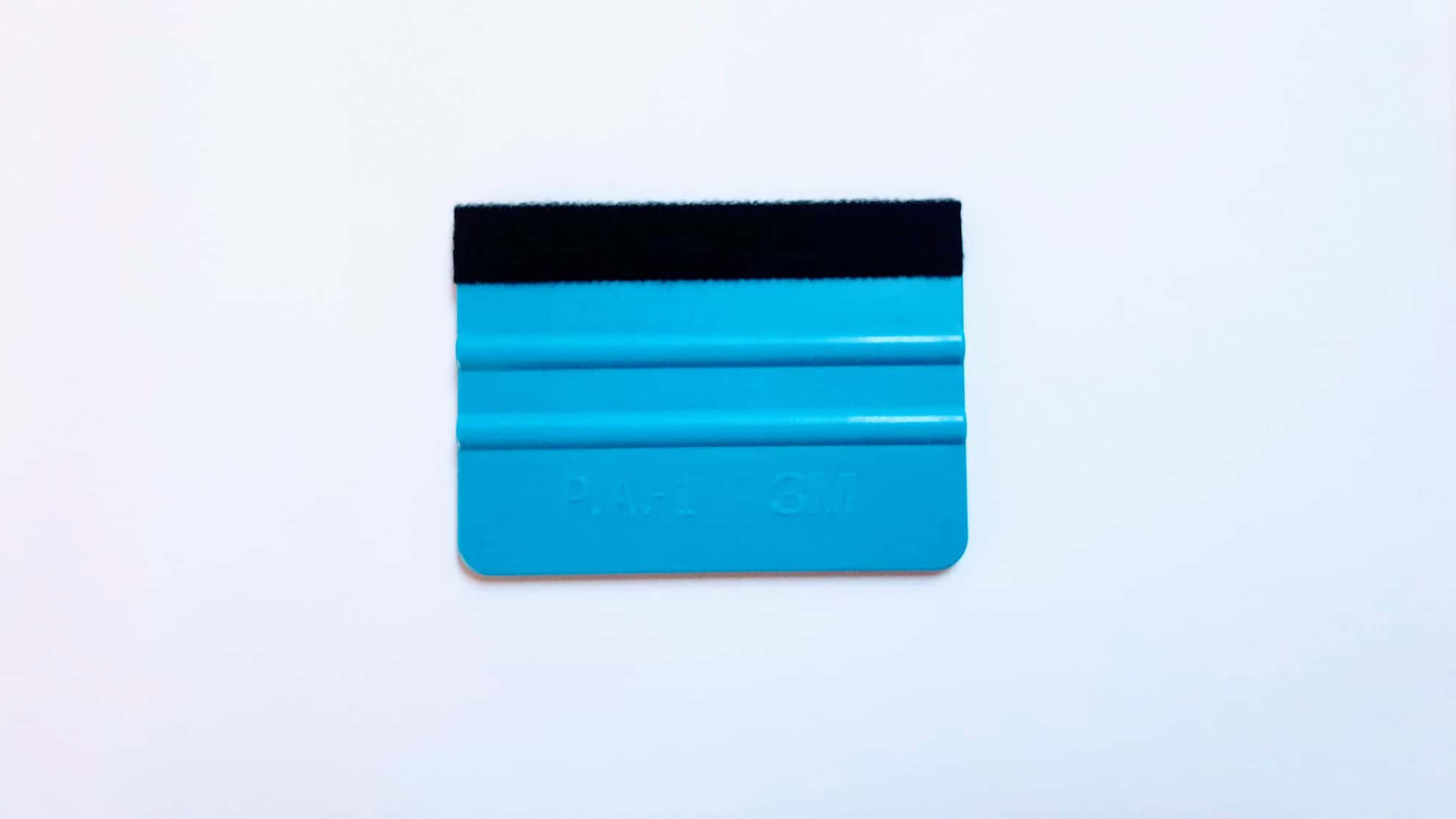 Spatola per applicazione adesivi