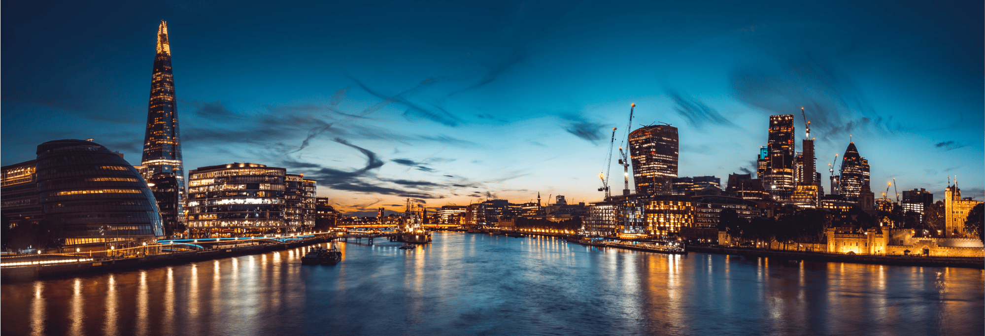 Recordsure's London office by the Thames at night