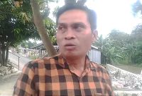 Kepala Desa Jambe Rudi Hartono, saat menjelaskan terkait alasan pembongkaran kios pasar.