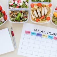 top-view-assortment-food-with-planner top-view-assortment-food-with-planner