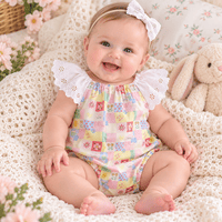 Baby girl wearing a seaside princess cotton romper