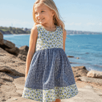 A girl Modeling the SIZE 5 Lola Sundress