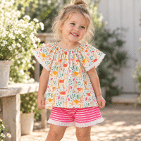 Girl wearing SIZE 2 Llama Print Top & Pink Stripe Shorts Set