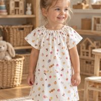 Girl at play wearing the Sweet Treats Simple Aline Dress