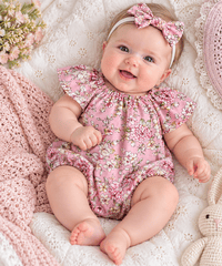 baby girl wearing seaside Romper in Pink Flowers