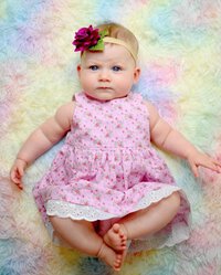 Eloisa wearing Australian handmade children's clothing by Karousel Kids