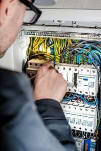 Electrician working on a DB