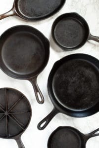how to clean, season, and wash cast iron skillets - via goodfoodstories.com