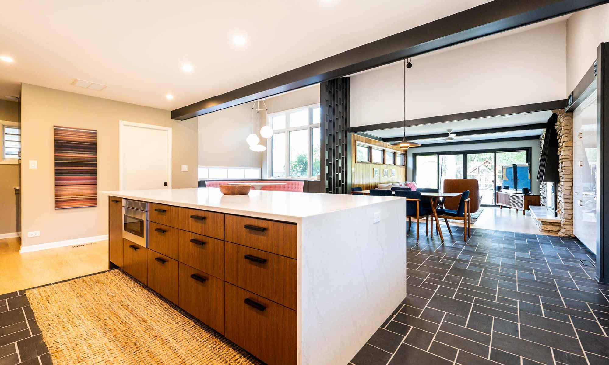 view of walnut island in luxury mid century kitchen remodel