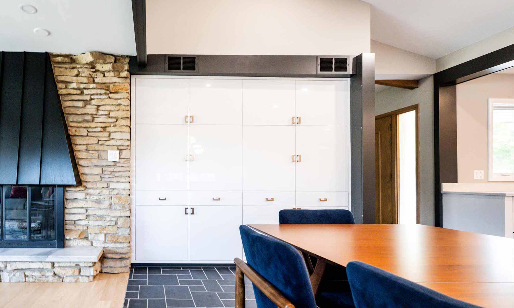 gloss white wall cabinets in mid century family room