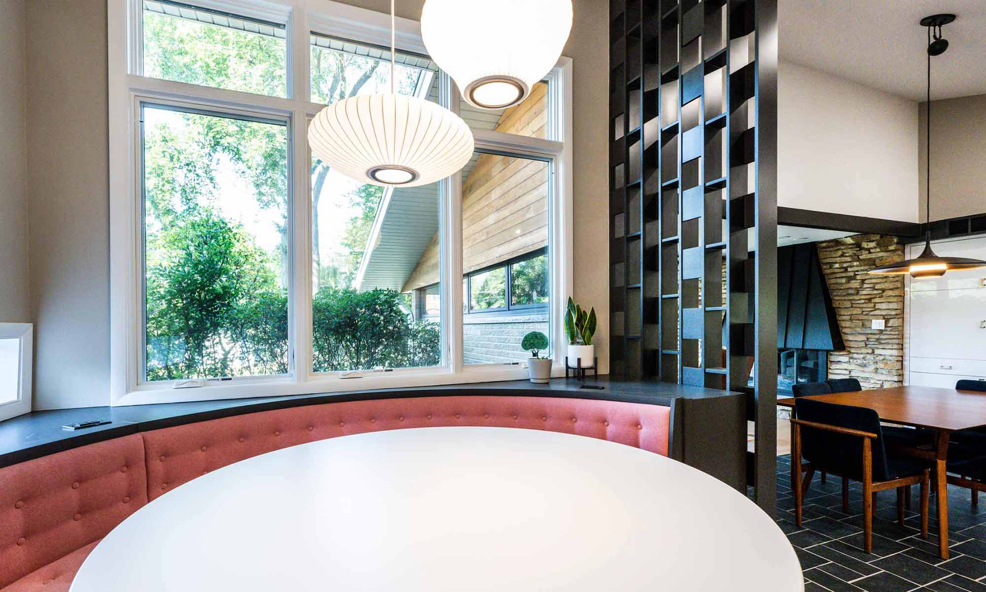 view from corner round booth seating of architectural feature wall