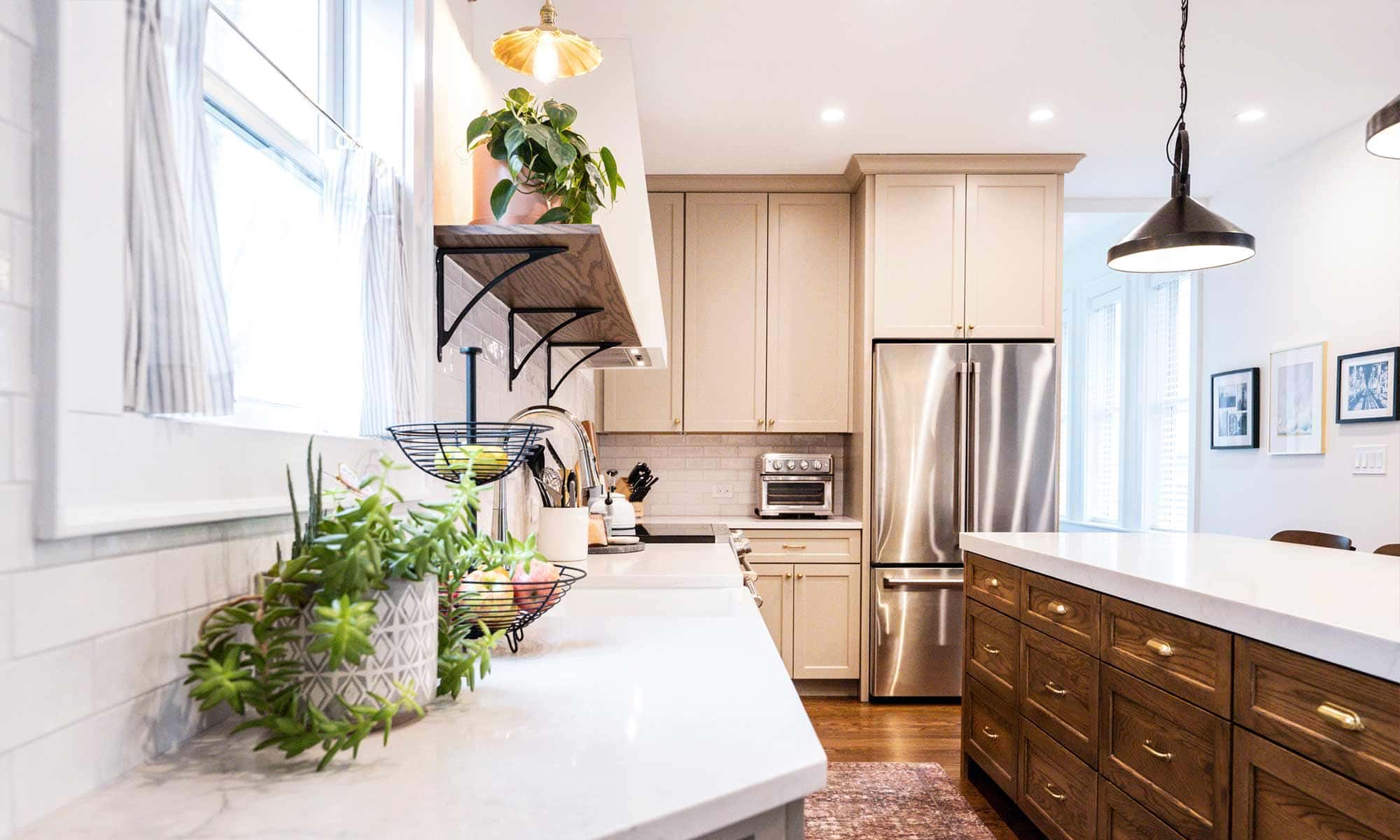 view of kitchen range farmhouse sink and open wood shelves in vintage la grange park kitchen remodel