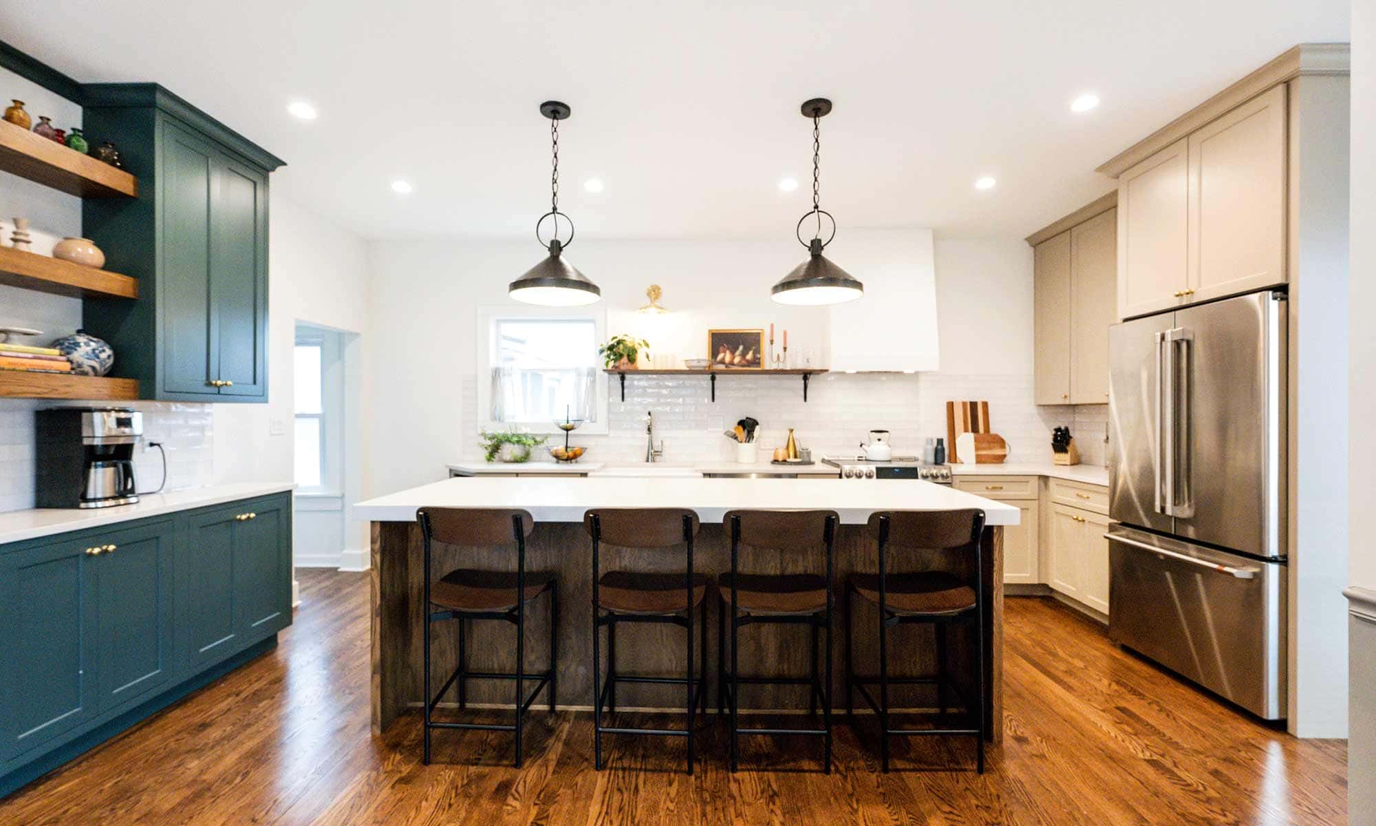 dark wood kitchen island with blue white and beige perimeter cabinetry in la grange park Illinois vintage kitchen remodel