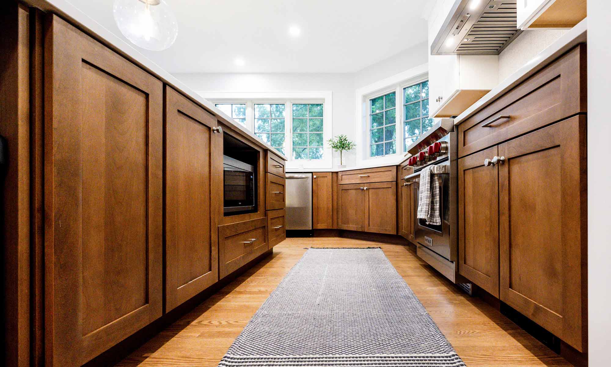 dark wood cabinets in luxury kitchen remodel