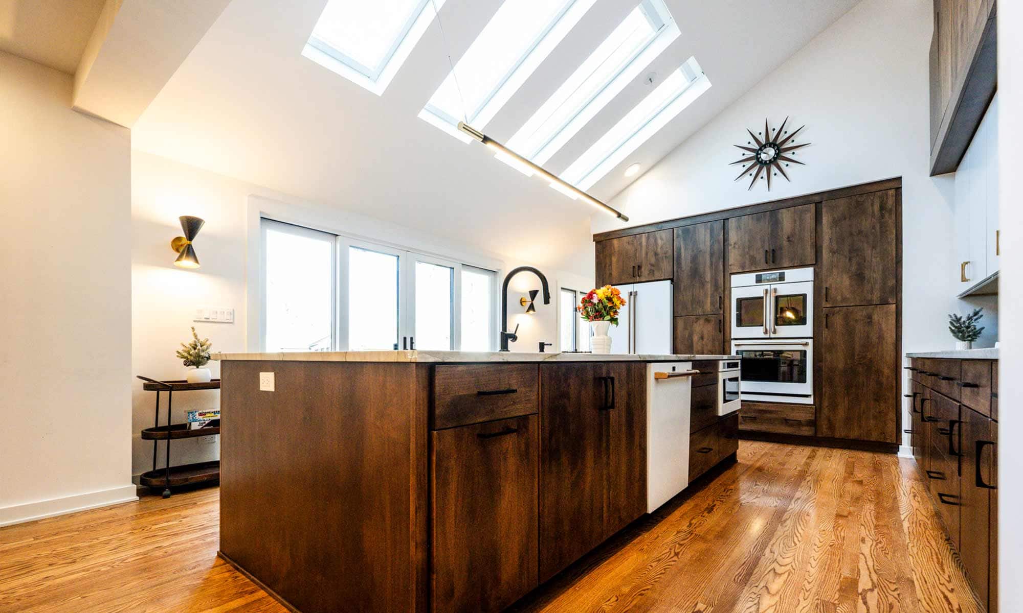 A bright kitchen featuring a skylight that illuminates the space with natural light.