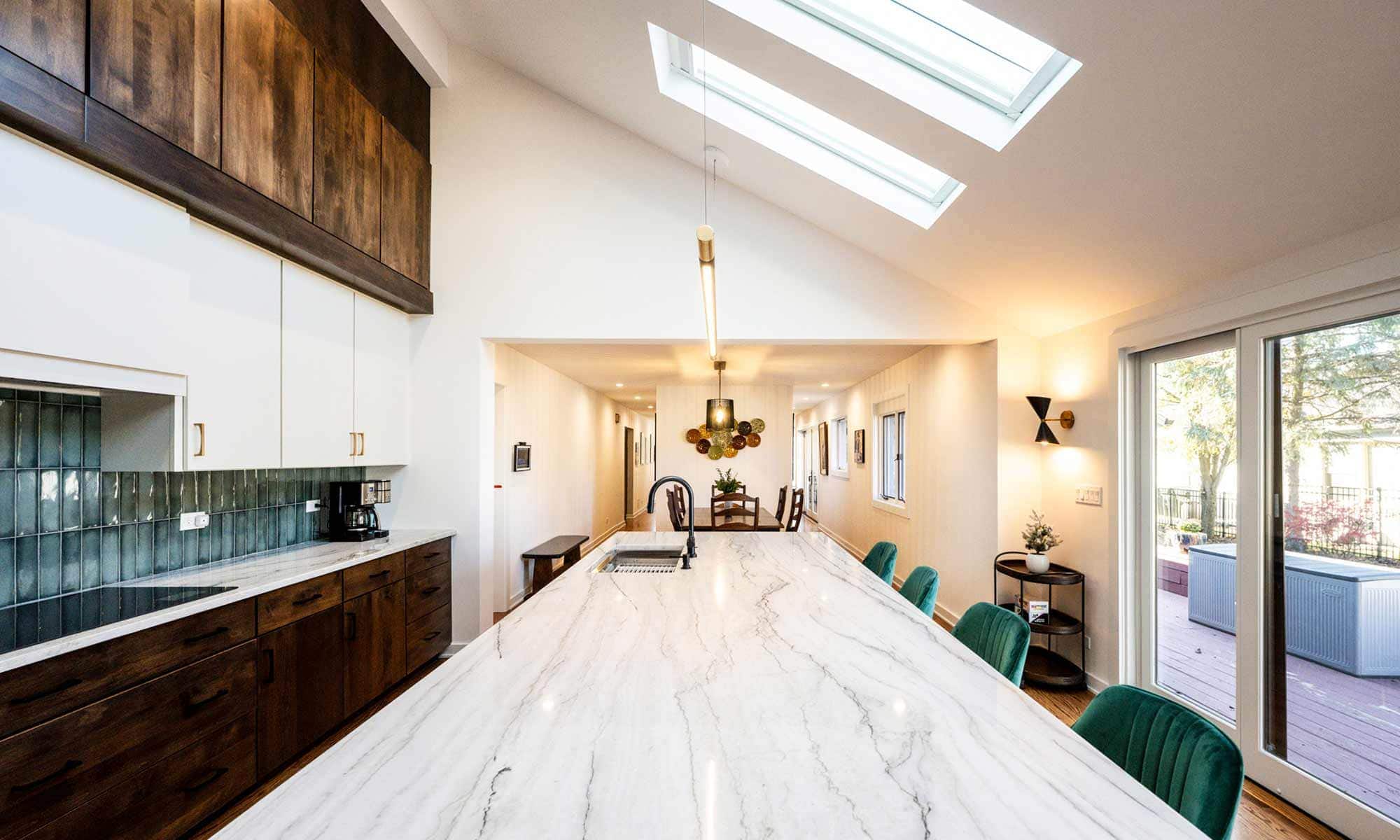 A bright kitchen featuring a skylight that illuminates the space with natural light.